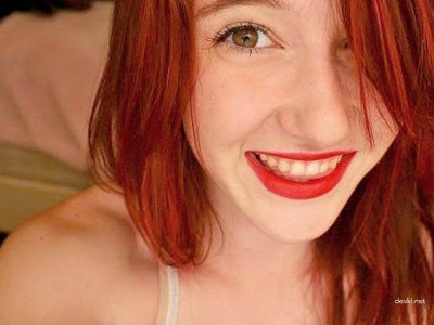 Домашнее видео рыжей красотки с обалденным бюстом