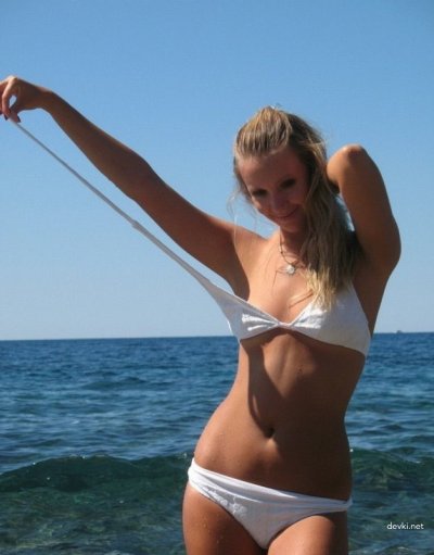 Интимные фото с возлюбленной на берегу океана