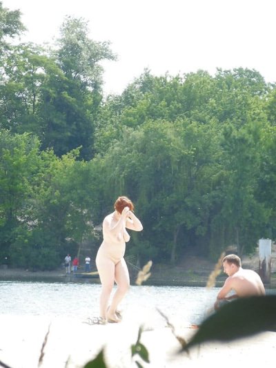 Скрытая эротика с песочком: пикантные кадры с берега