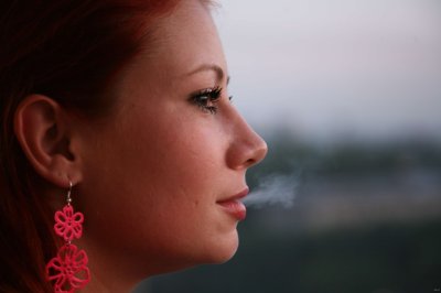 Профессиональная фотосессия с огненно-рыжей красоткой для взрослых