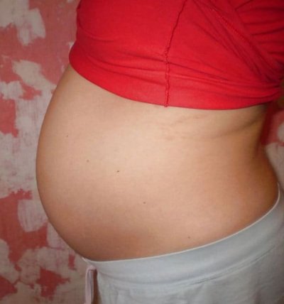 Интимные фото беременной красотки в домашней обстановке